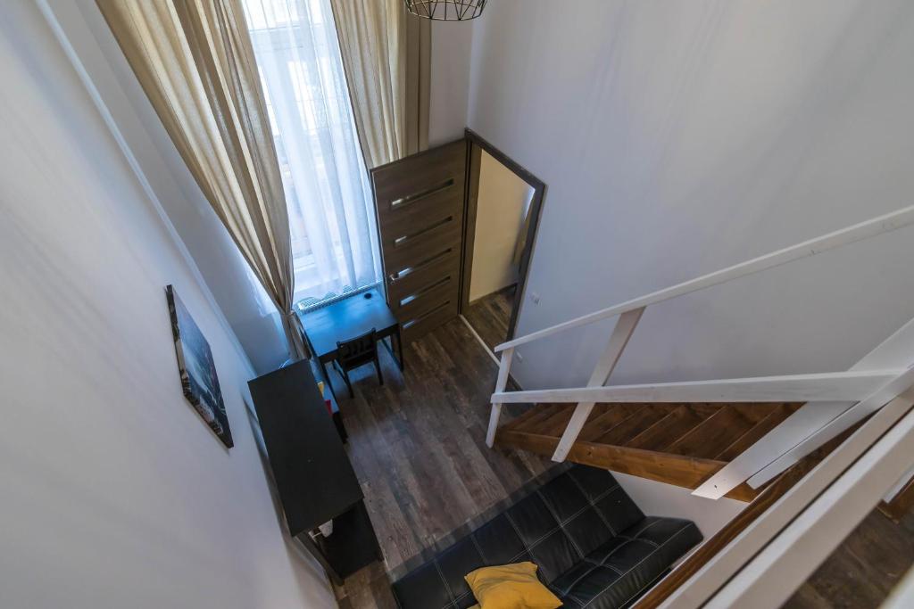 Televízia a/alebo spoločenská miestnosť v ubytovaní Katarina Apartment Blaha Square