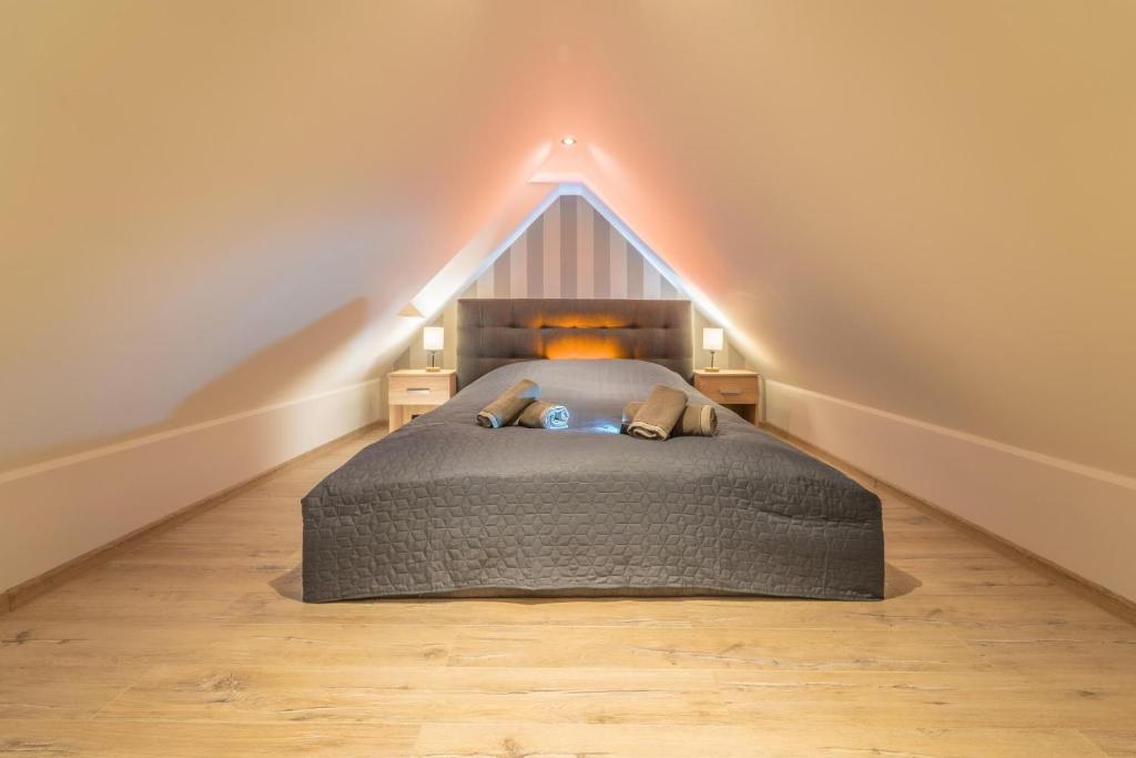 Posteľ alebo postele v izbe v ubytovaní Apartamenty Bunny Aparts