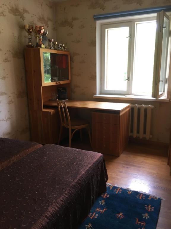 Postel nebo postele na pokoji v ubytování Voosemetsa Turismitalu