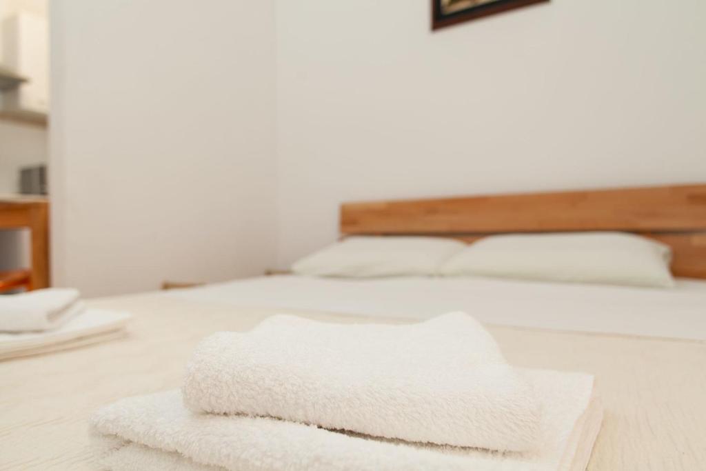 Posteľ alebo postele v izbe v ubytovaní Apartment Stara vrata