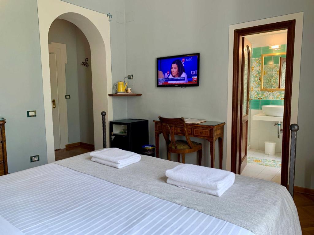 Postel nebo postele na pokoji v ubytování Hotel David