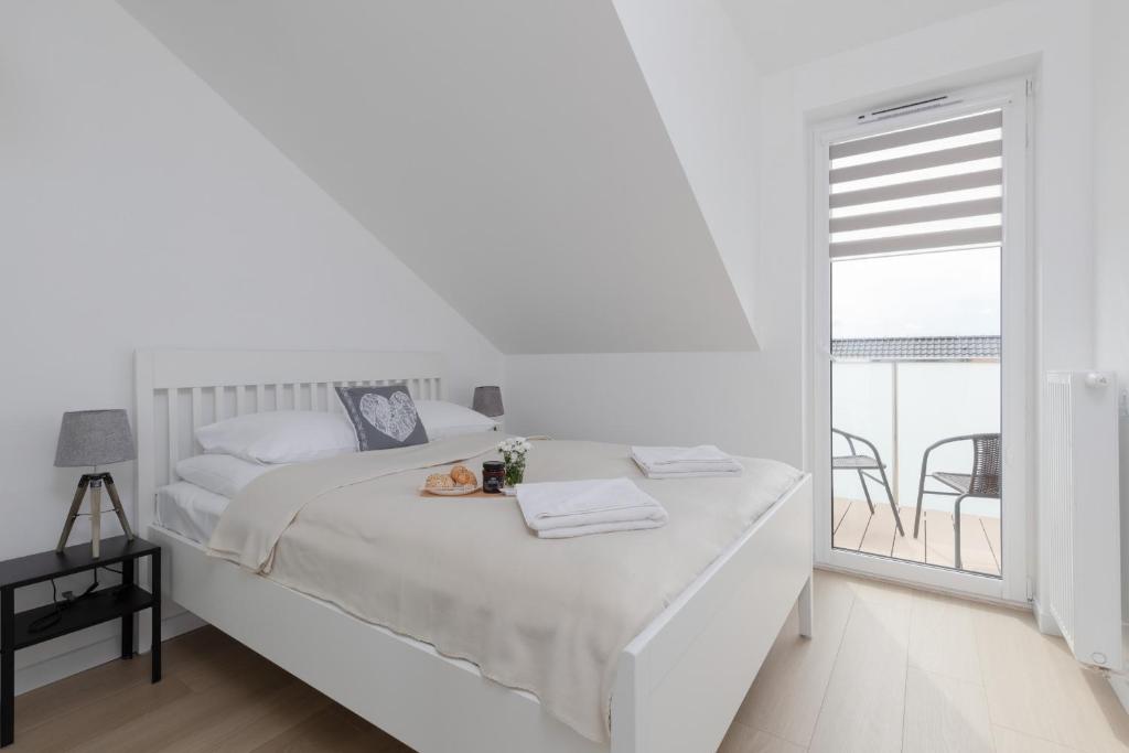 Posesja Kapitańska Przy Plaży Apartments Grzybowo by Noclegi Renters - Appartement Met Balkon