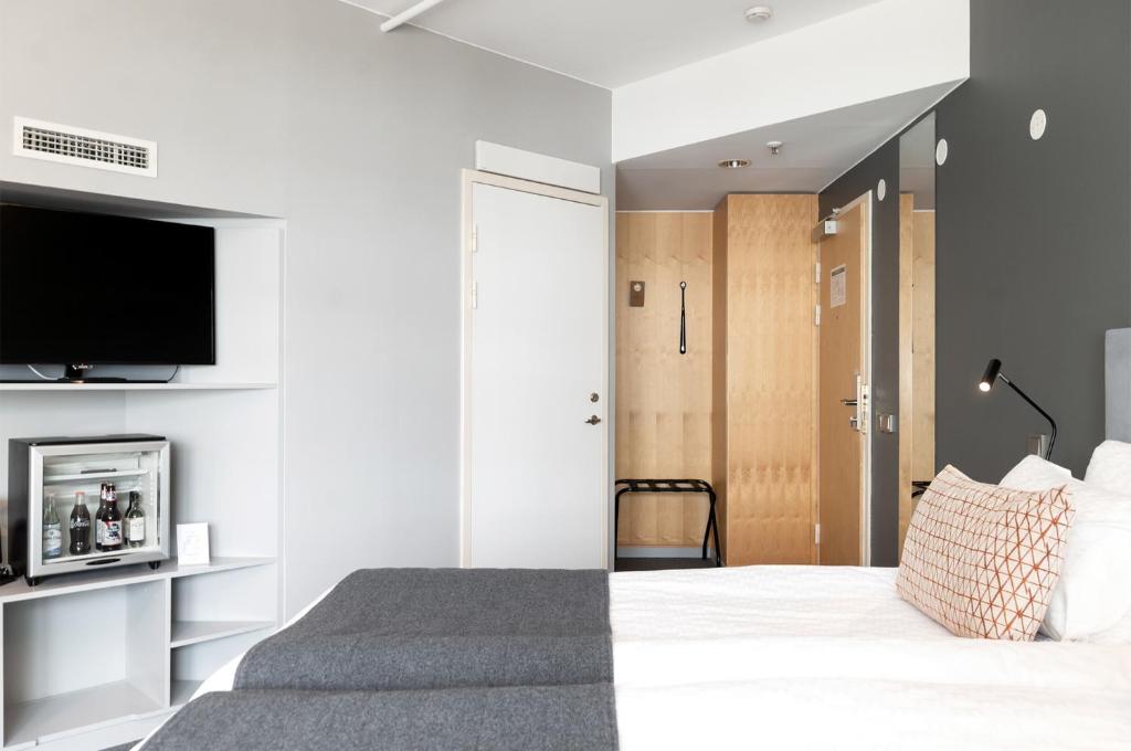 Postel nebo postele na pokoji v ubytování Elite Park Hotel