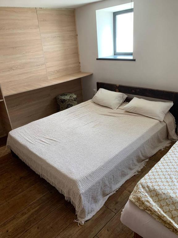 Postel nebo postele na pokoji v ubytování Krone Hostel