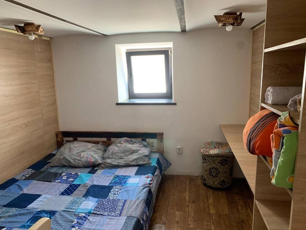 Postel nebo postele na pokoji v ubytování Krone Hostel