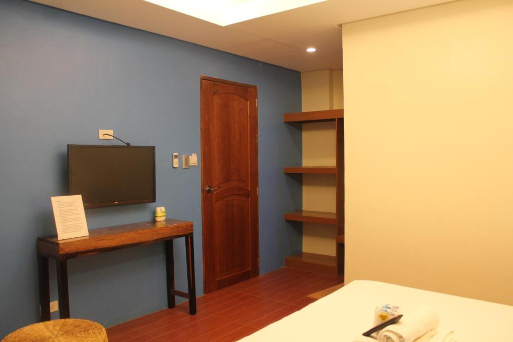 TV a/nebo společenská místnost v ubytování Aqua Travel Lodge