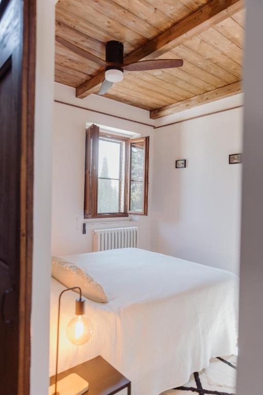 Postel nebo postele na pokoji v ubytování Agriturismo Qui Voglio