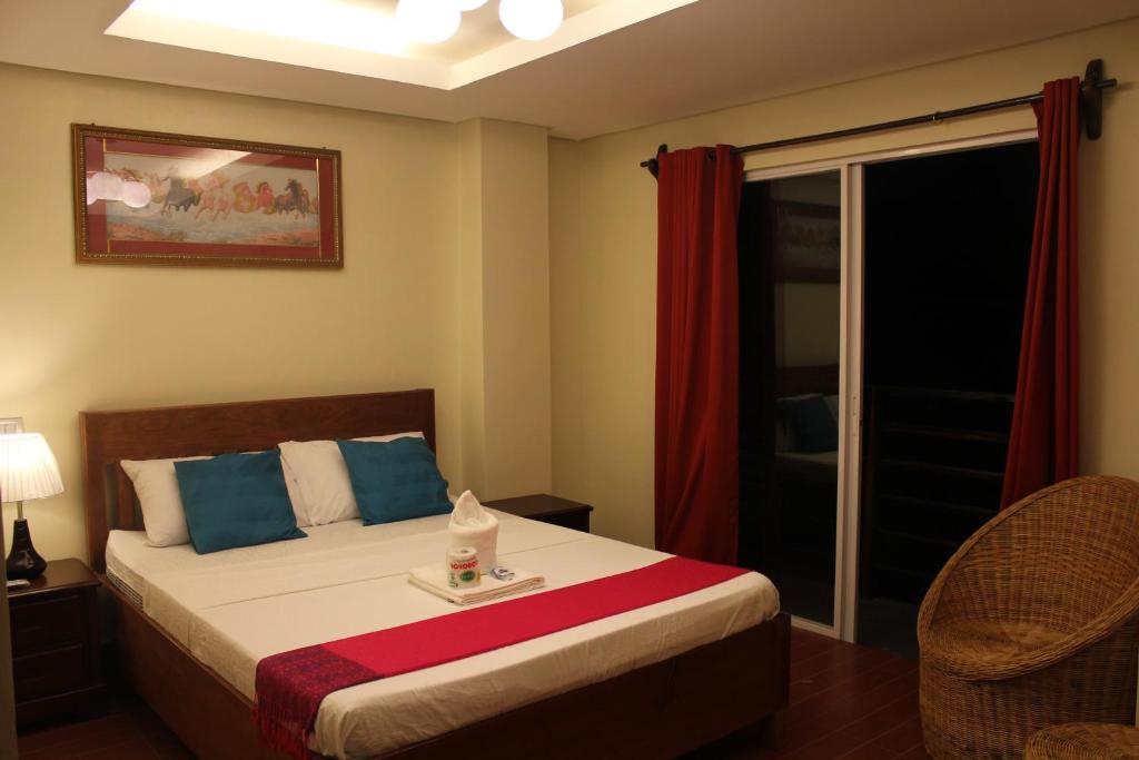 Postel nebo postele na pokoji v ubytování Aqua Travel Lodge