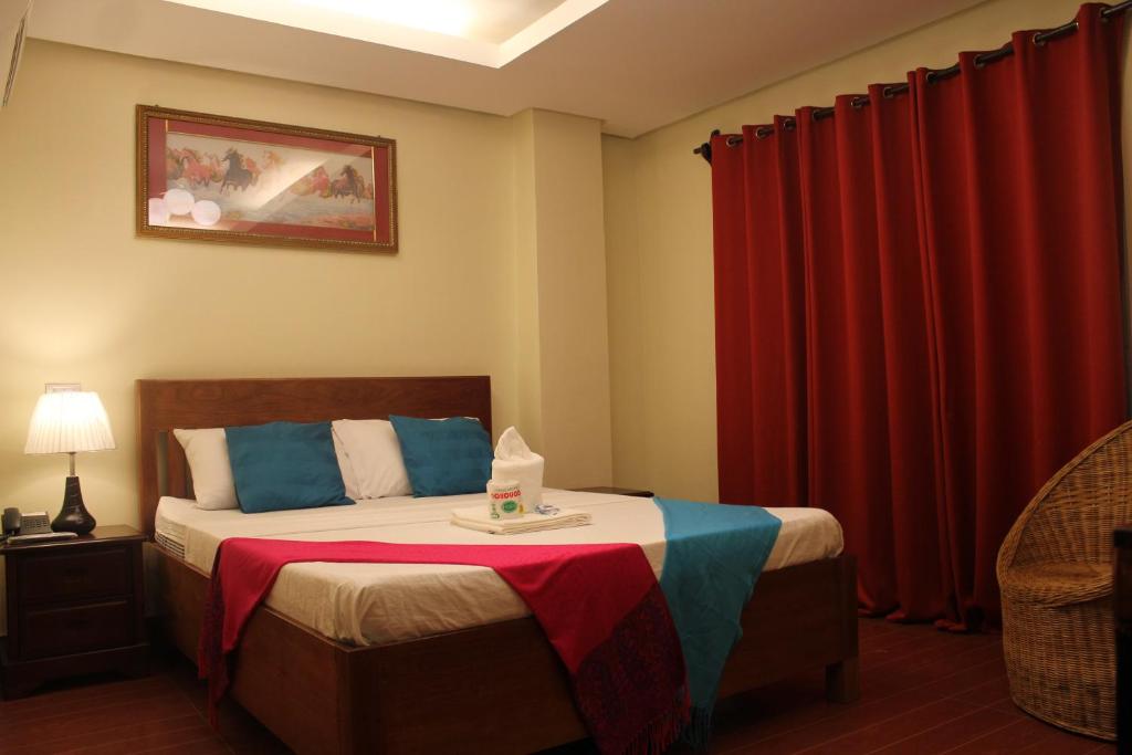 Postel nebo postele na pokoji v ubytování Aqua Travel Lodge