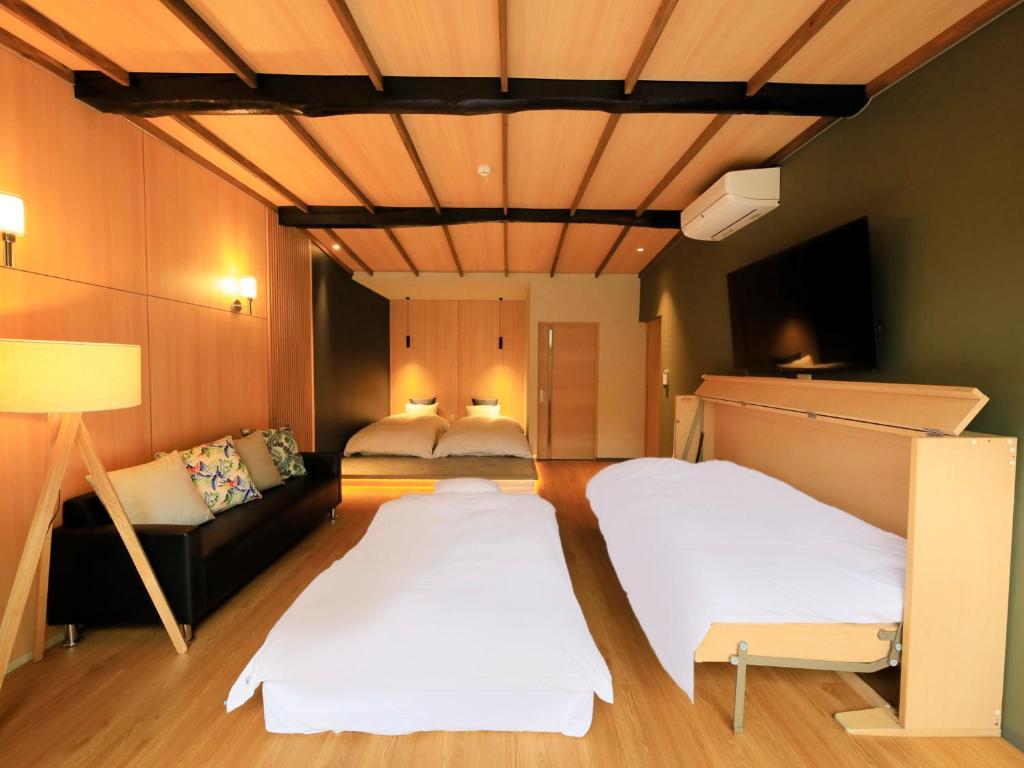 Postel nebo postele na pokoji v ubytování SPRINGS VILLAGE 足柄 丹沢温泉リゾート＆グランピング