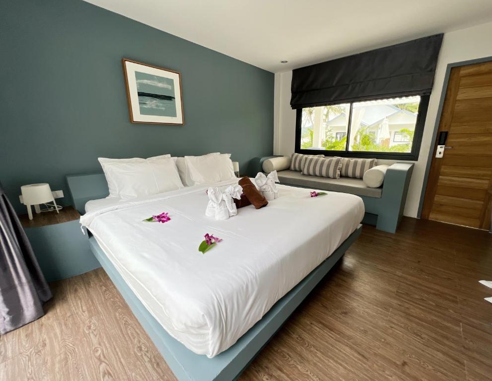 Postel nebo postele na pokoji v ubytování Pearl of Samui Resort