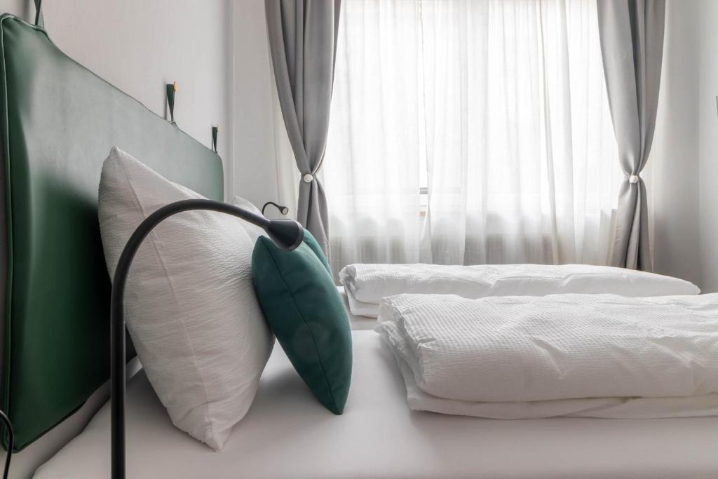 Posteľ alebo postele v izbe v ubytovaní Apartments Iris
