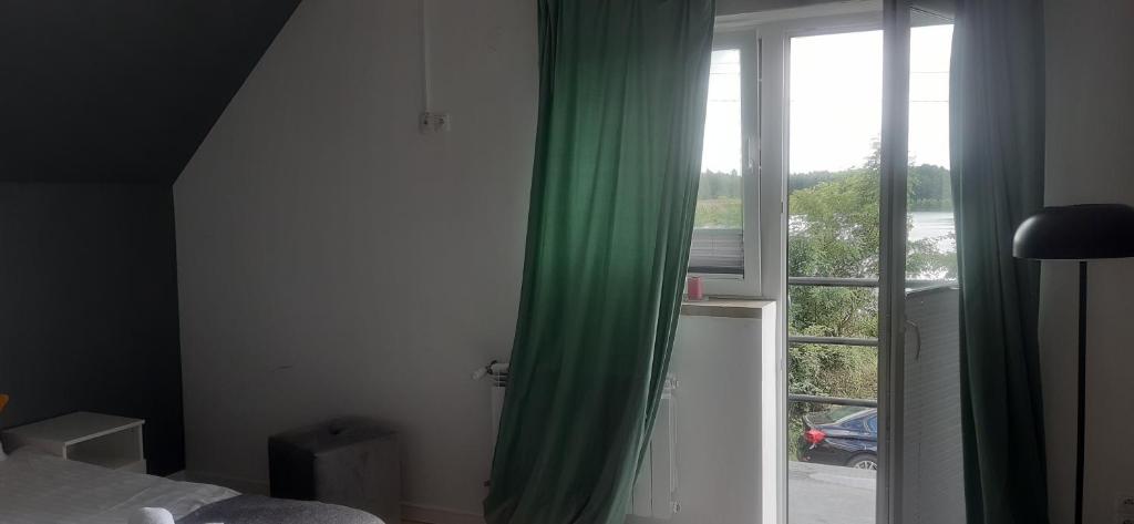Posteľ alebo postele v izbe v ubytovaní Pokoje blisko SUNTAGO