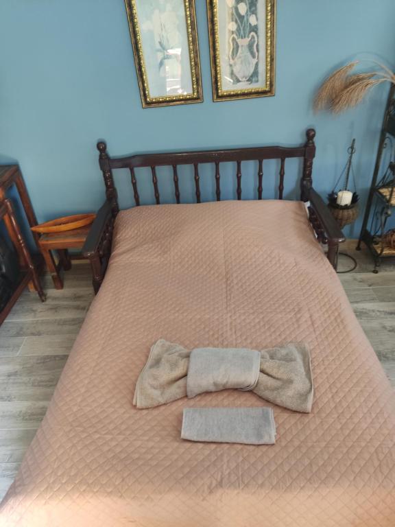 Postel nebo postele na pokoji v ubytování Akamatra House