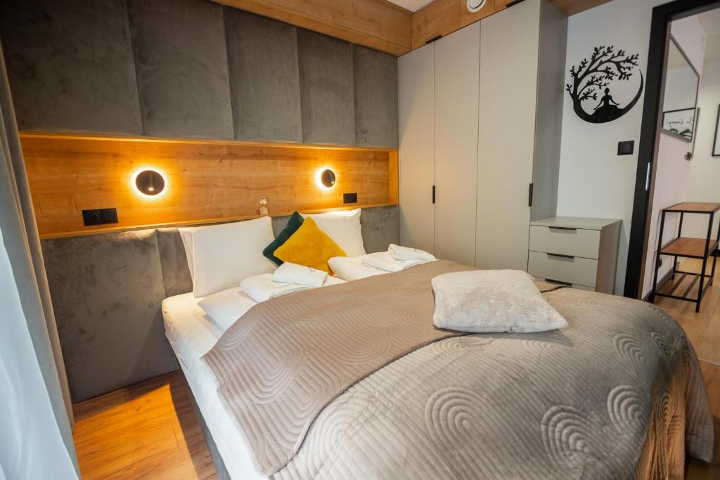 Posteľ alebo postele v izbe v ubytovaní Apart Invest Centrum Park 18