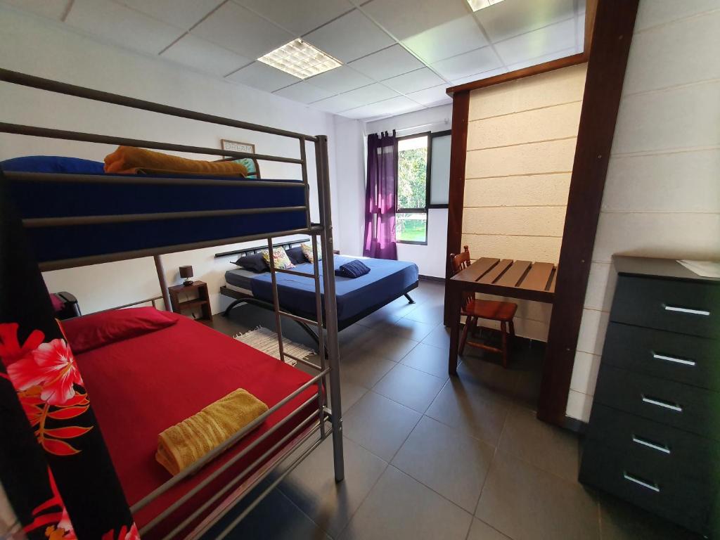 Letto o letti in una camera di Residence Vainau Moorea