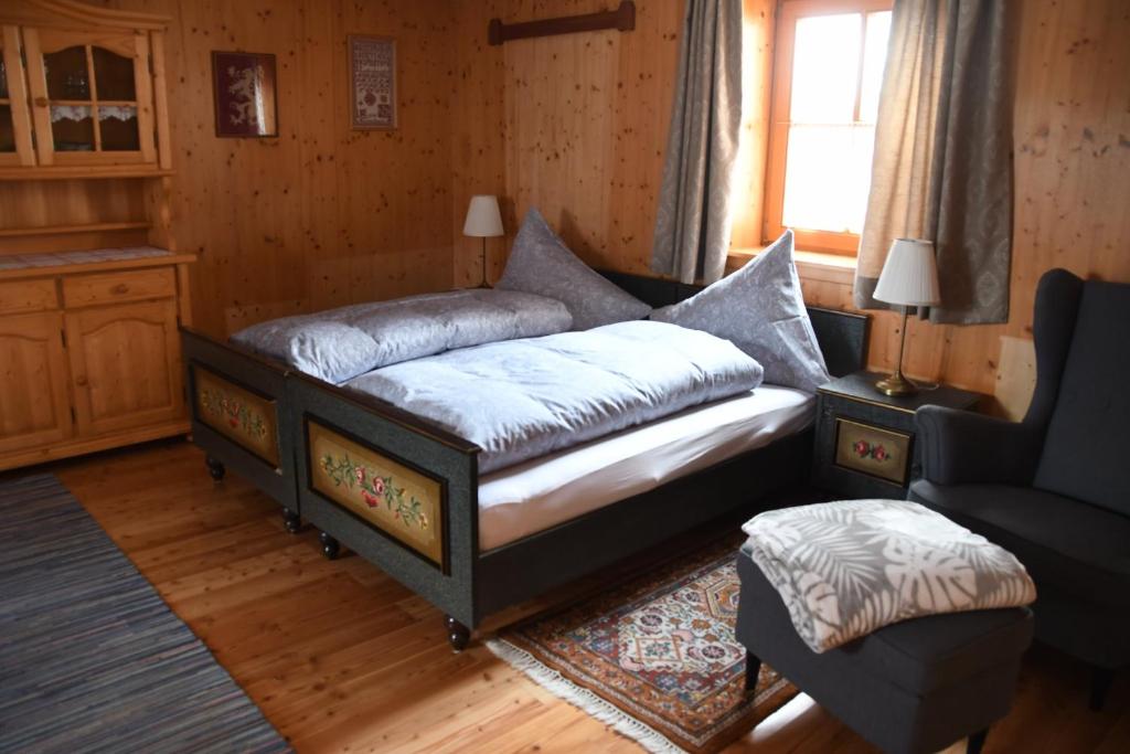 Postel nebo postele na pokoji v ubytování Kellerstöckl Maierjörgl