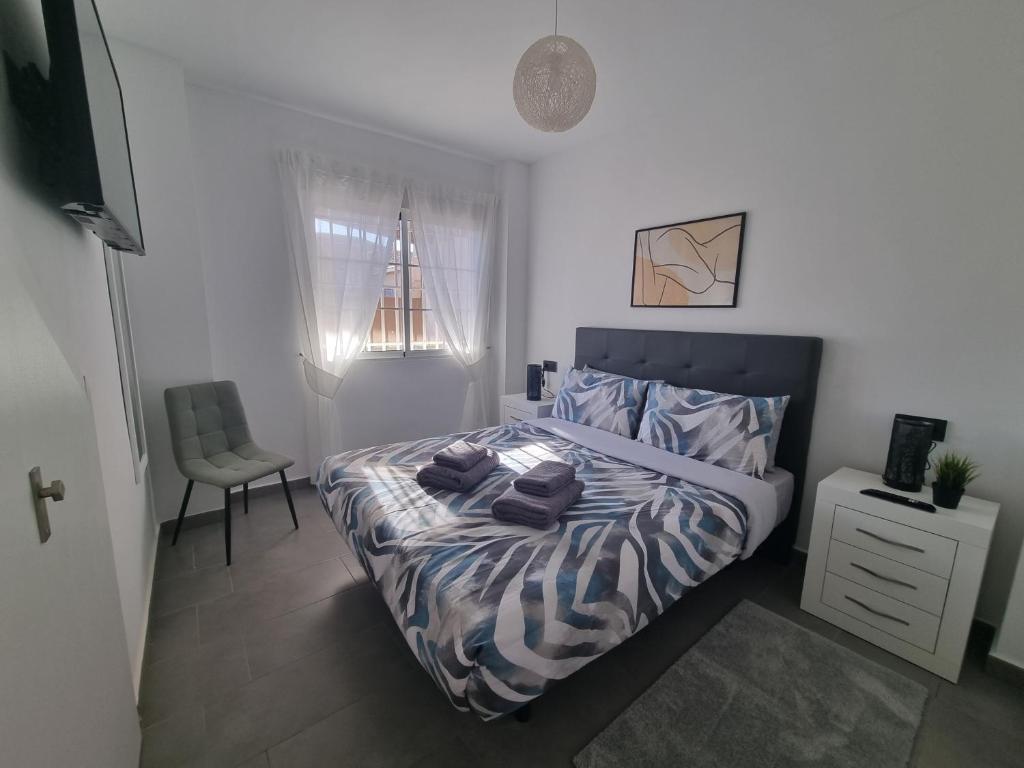 Posteľ alebo postele v izbe v ubytovaní 4 Bedroom Villa Private Pool Punta Prima