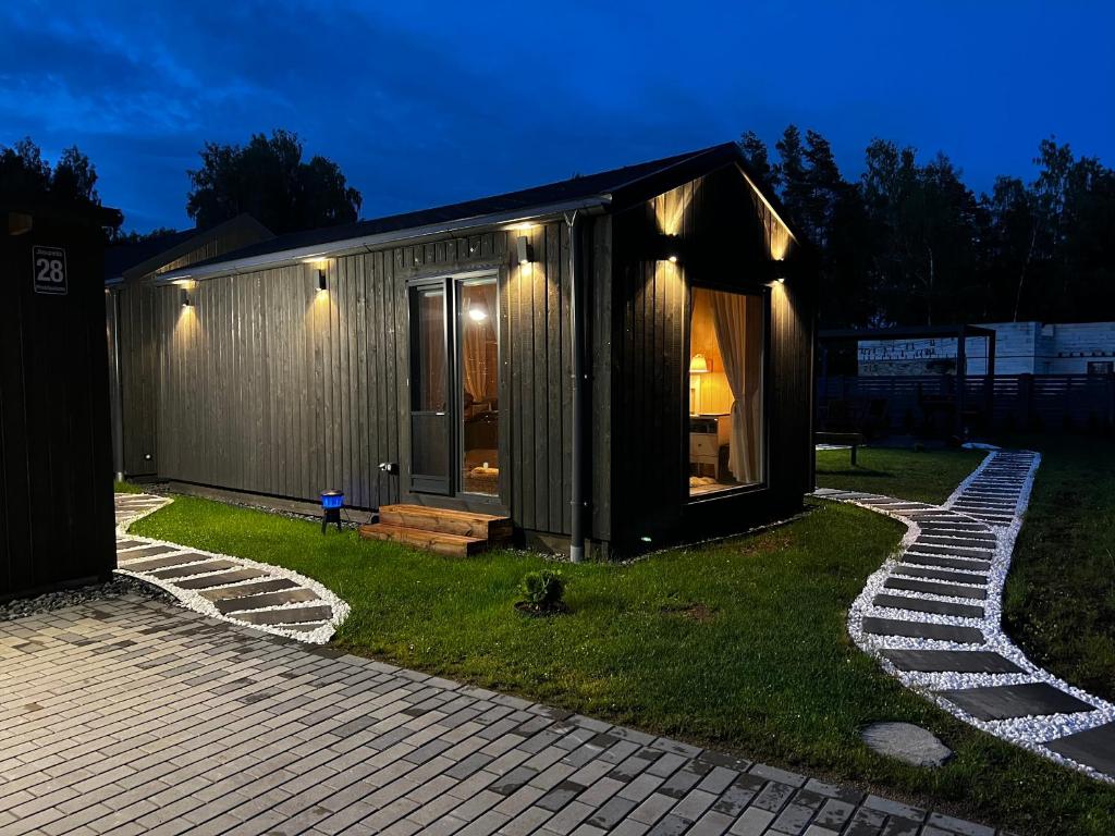 a smallernessernessernessolithicolithicolithicolithicolithicolithicolithicolithicolithicolithicolithic at Romantic Holiday House Nandi Rezidence Janupietis in Mellupi