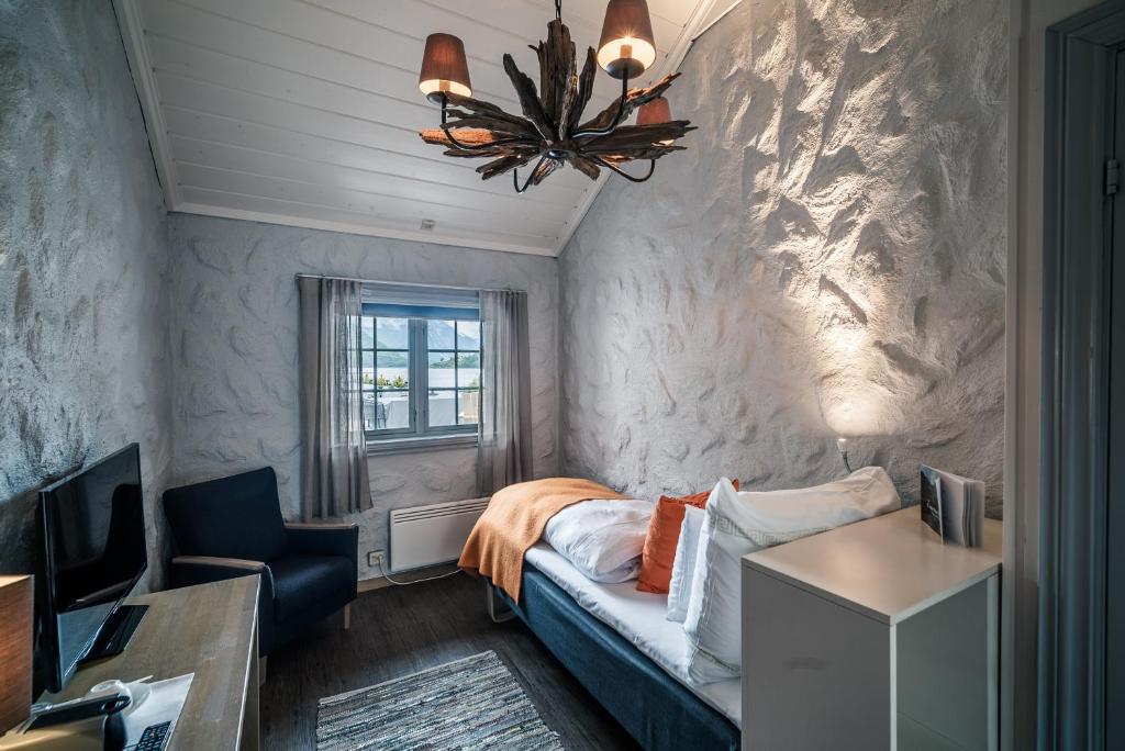 Postel nebo postele na pokoji v ubytování Sagafjord Hotel - by Classic Norway Hotels