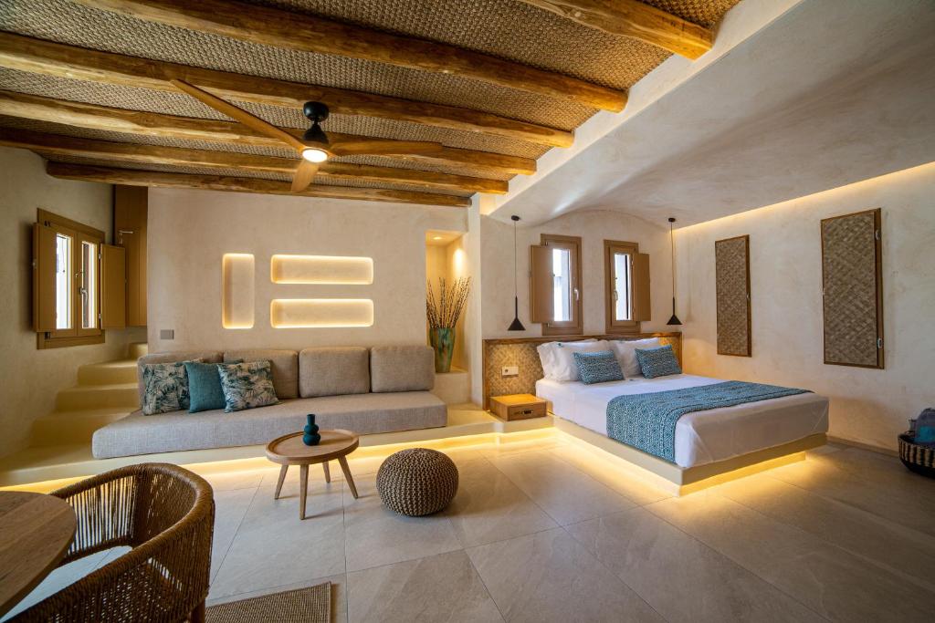 Postel nebo postele na pokoji v ubytování Opalia Suites
