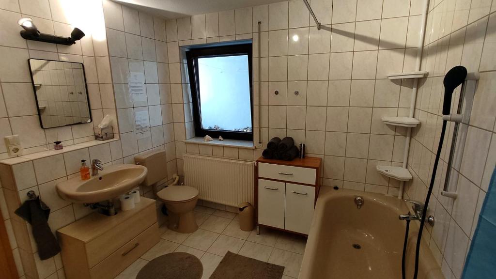 Koupelna v ubytování *Gemütliche Ferienwohnung in perfekter Lage*