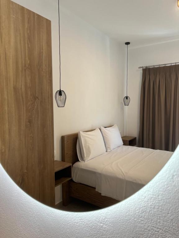Postel nebo postele na pokoji v ubytování angels apartments