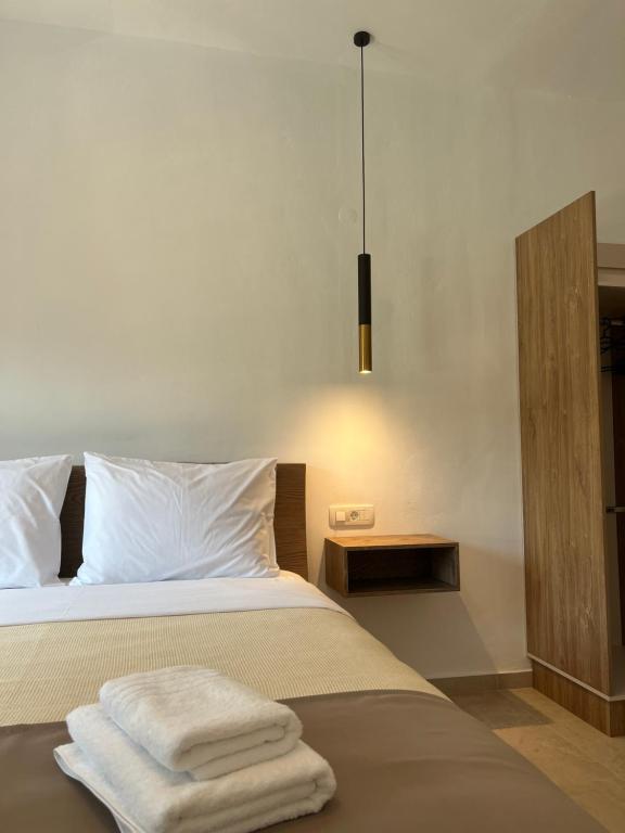 Postel nebo postele na pokoji v ubytování angels apartments