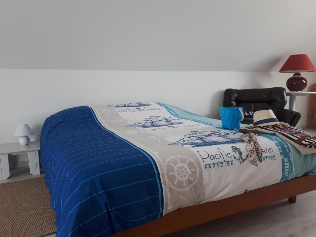 Postel nebo postele na pokoji v ubytování macareux