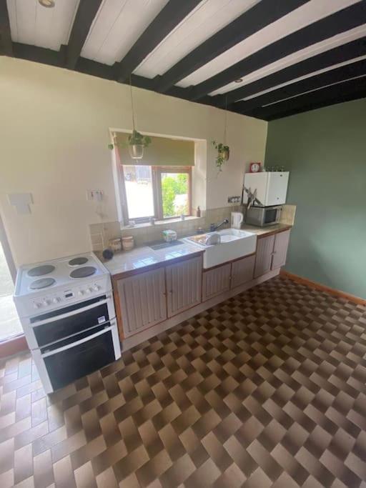 Kuchyň nebo kuchyňský kout v ubytování CuckOO Nest Entire house