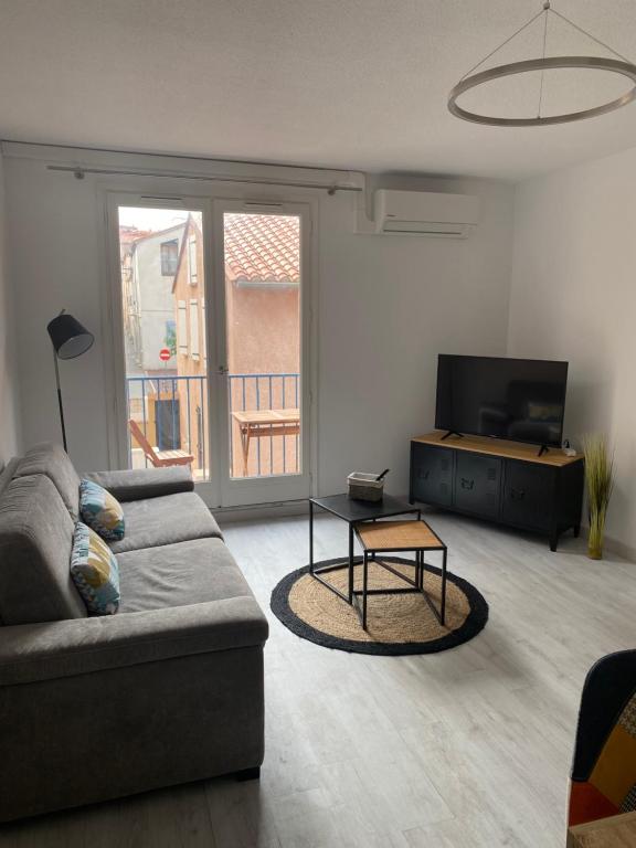 Posedenie v ubytovaní Superbe appartement climatisé avec parking privé