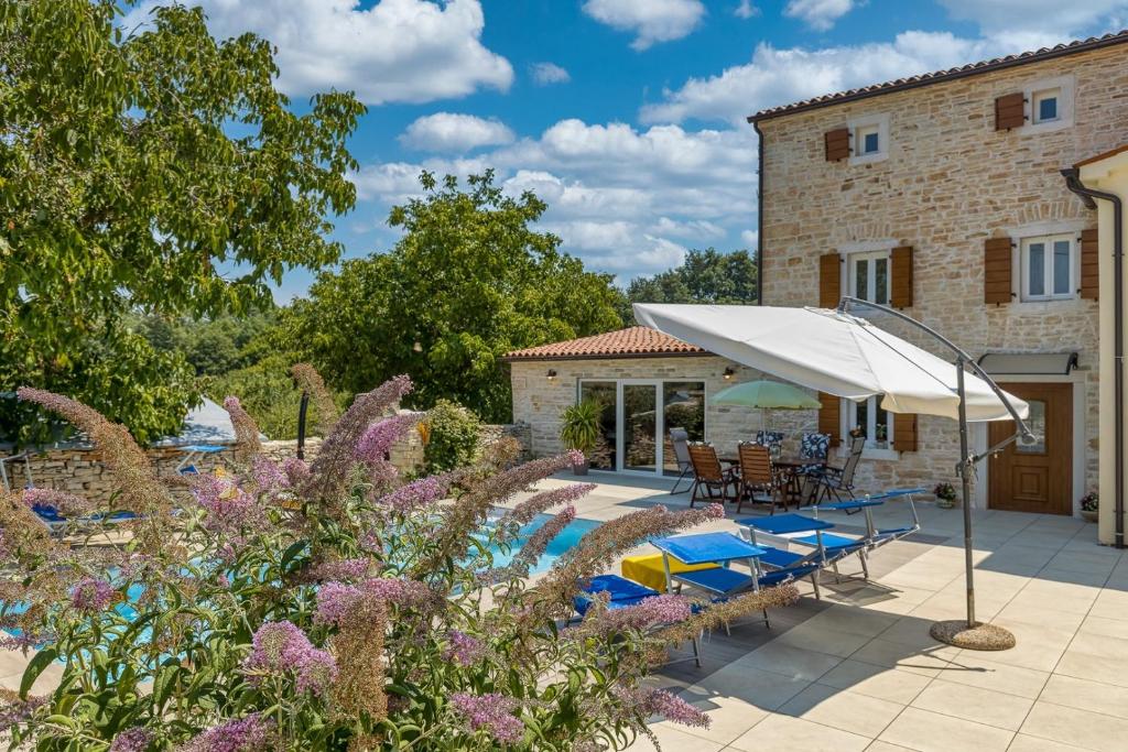 Vonkajšia záhrada v ubytovaní Villa Butterfly