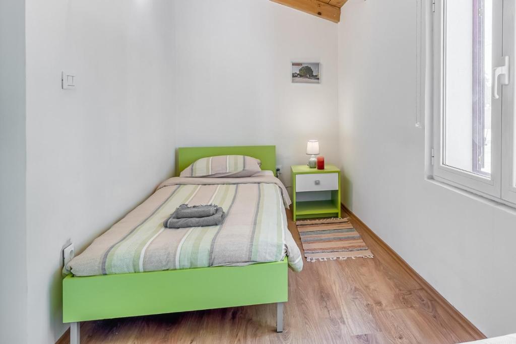 Posteľ alebo postele v izbe v ubytovaní Villa Butterfly