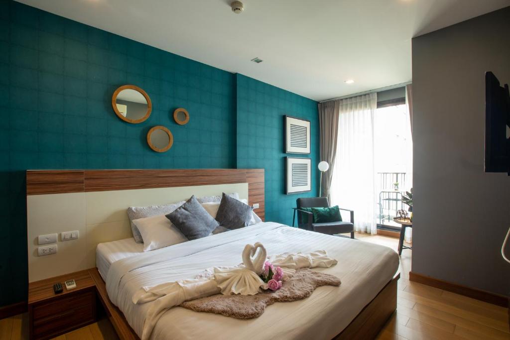 Postel nebo postele na pokoji v ubytování Cozy & Luxury Living in Chiang Mai
