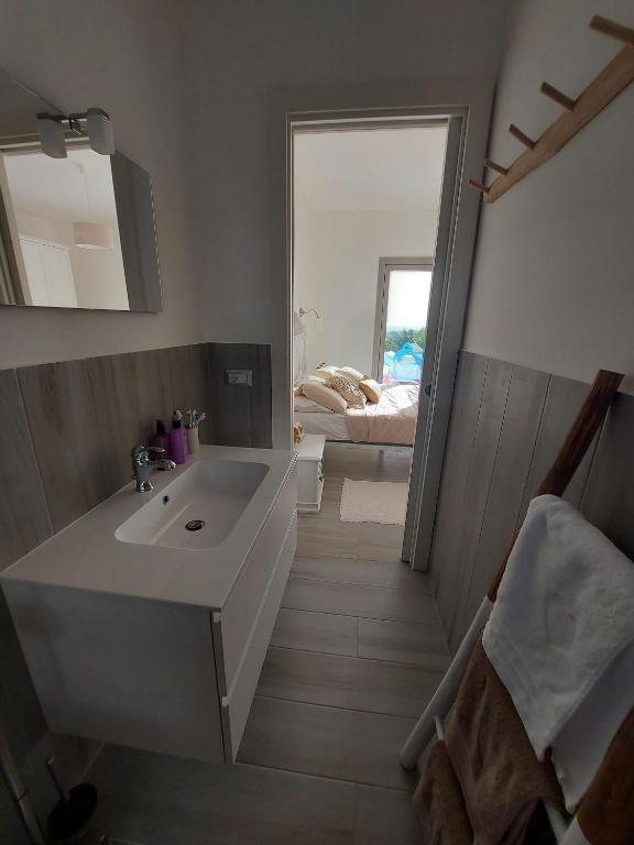 Łóżko lub łóżka w pokoju w obiekcie Villa Sara