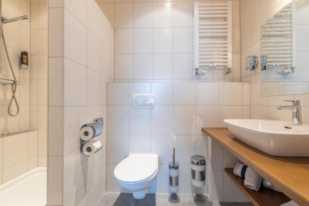 Koupelna v ubytování Hotel Rose