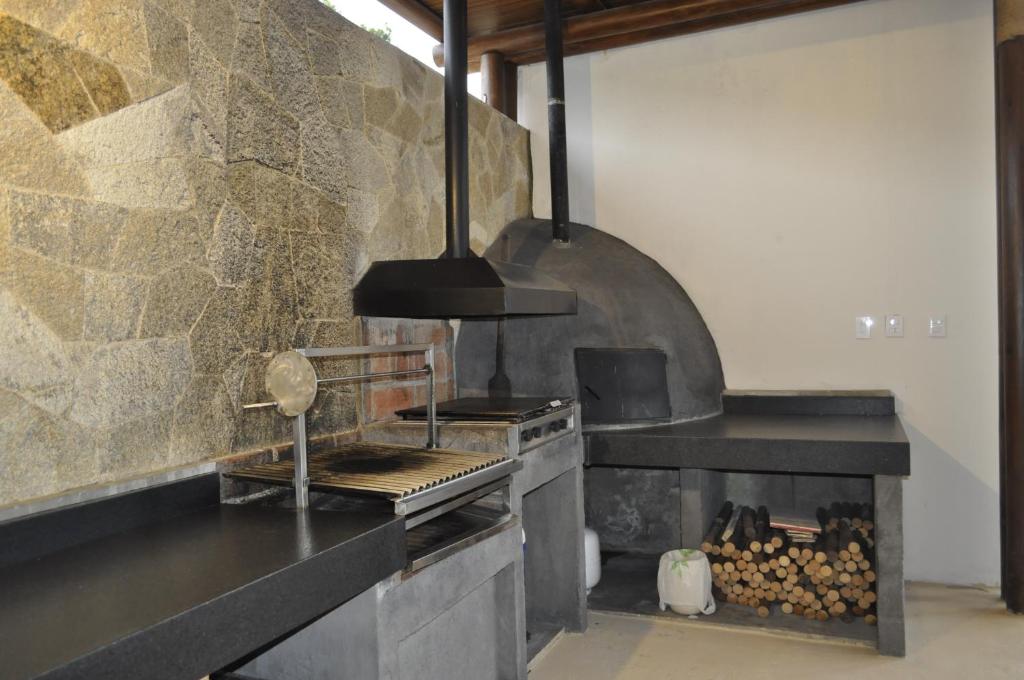 Kuchyň nebo kuchyňský kout v ubytování Cabaña Quinta Gaes Spa