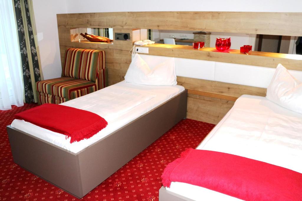 Postel nebo postele na pokoji v ubytování Hotel Weidenhof