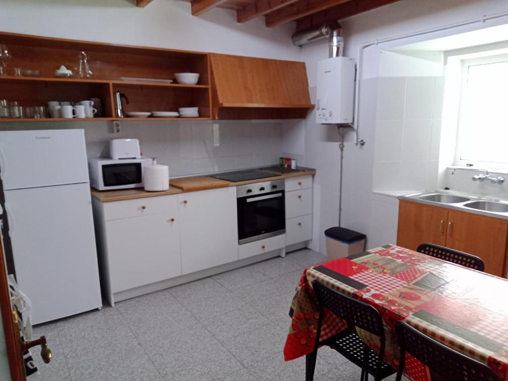 Kuchyňa alebo kuchynka v ubytovaní A Casa De Regina