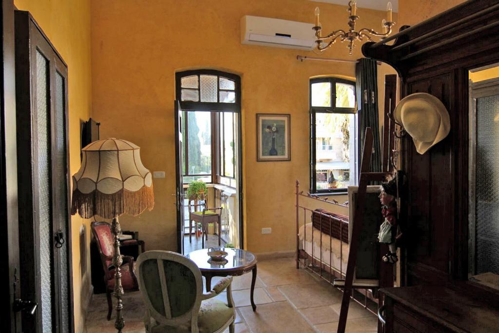 Posezení v ubytování Atelier Luxury Rooms