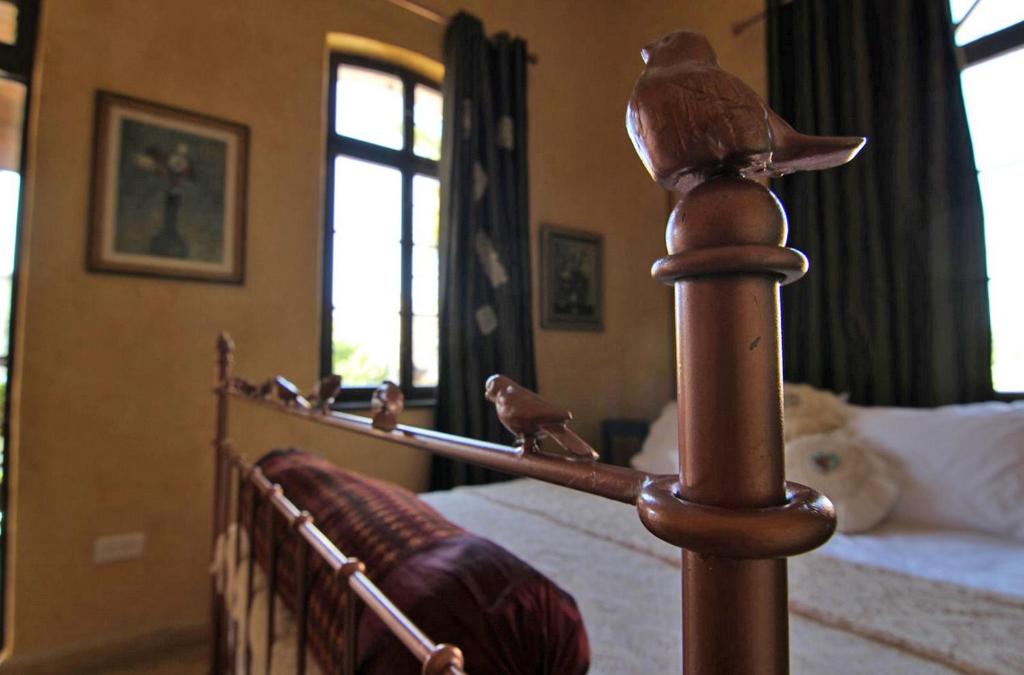 Postel nebo postele na pokoji v ubytování Atelier Luxury Rooms