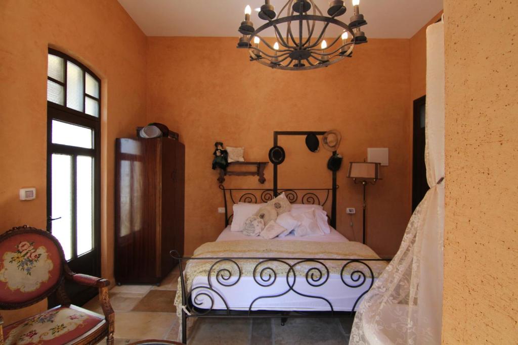 Postel nebo postele na pokoji v ubytování Atelier Luxury Rooms