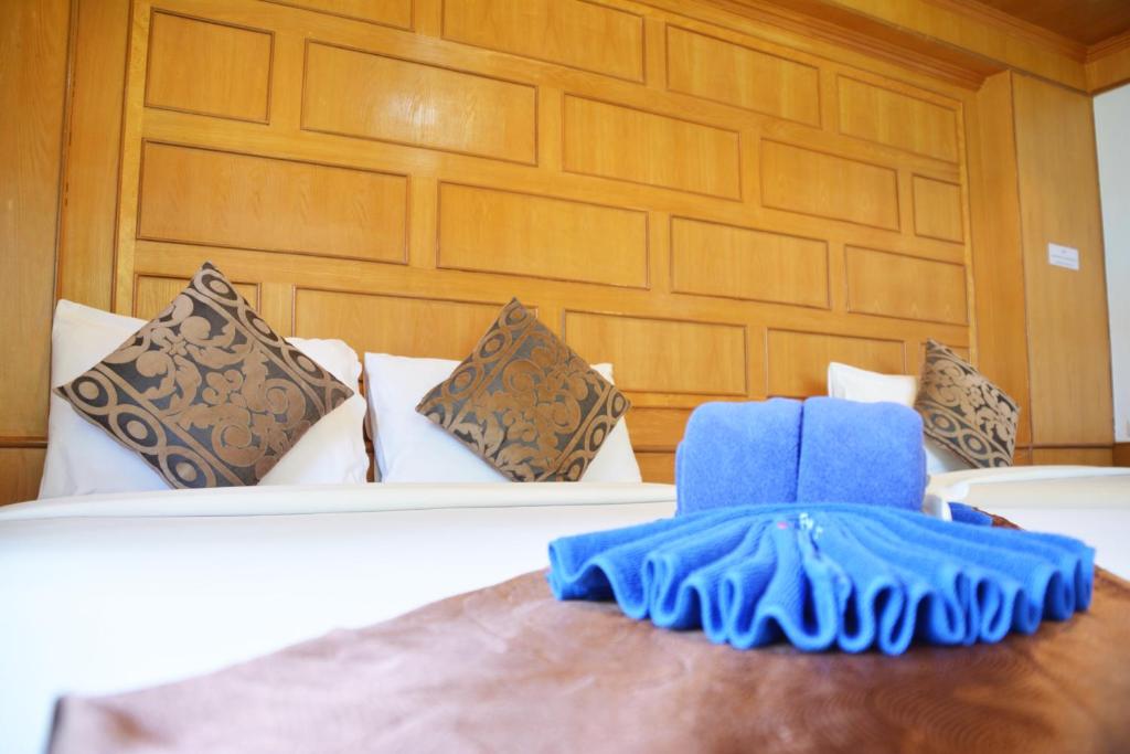 Postel nebo postele na pokoji v ubytování Kantiang Bay View Resort