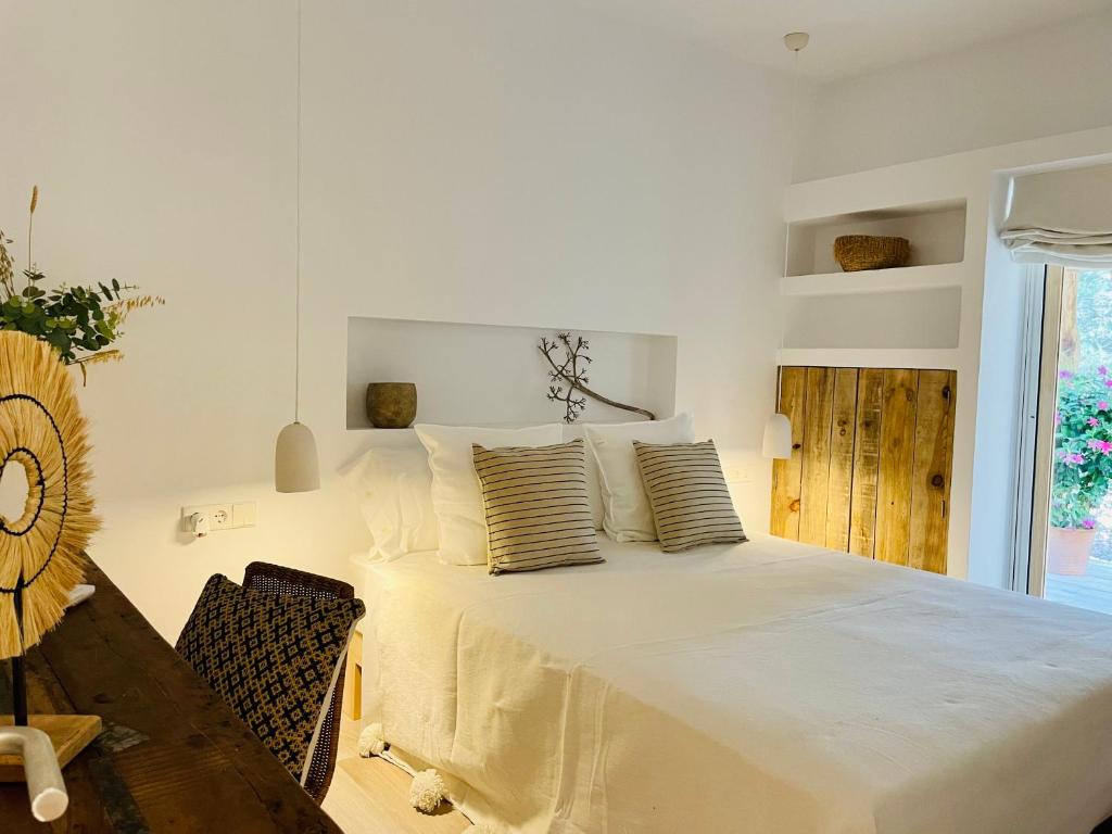 Postel nebo postele na pokoji v ubytování Casa del bosque