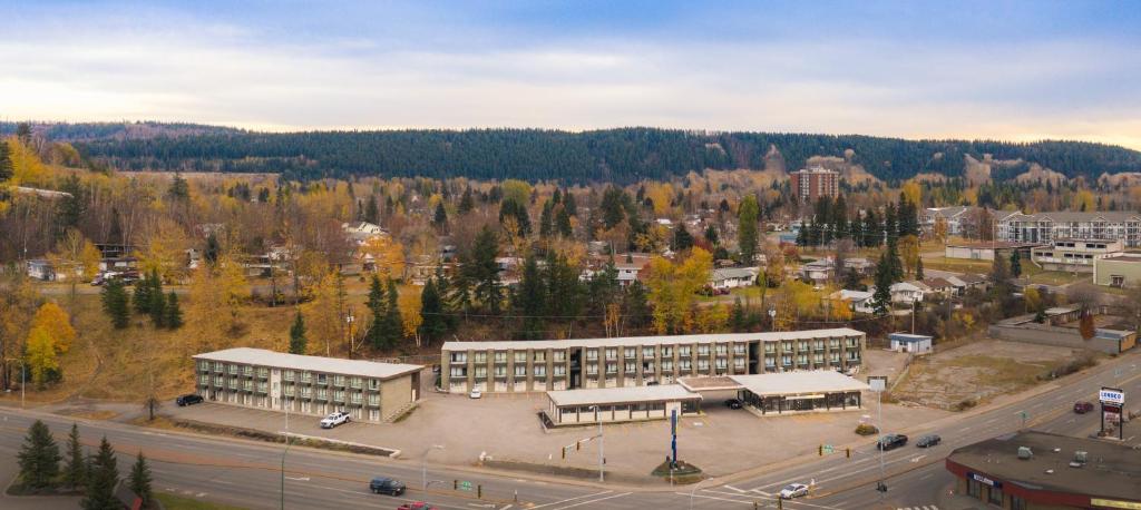 an aerial view of a building with a parking lot at North Star Inn & Suites in Prince George