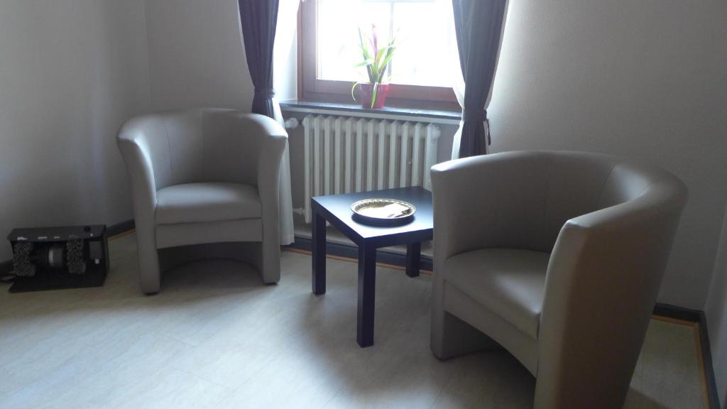 Зона вітальні в Central-Hotel Greiveldinger