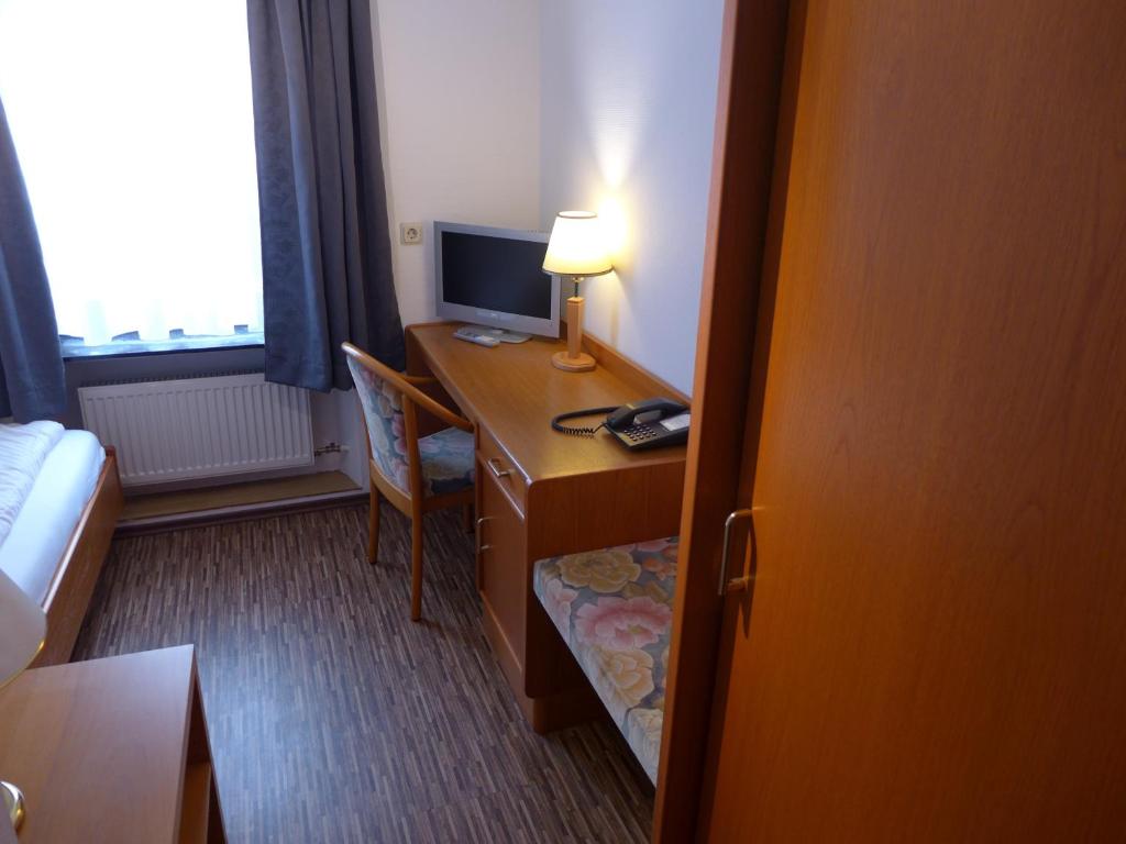 Телевізор і / або розважальний центр в Central-Hotel Greiveldinger