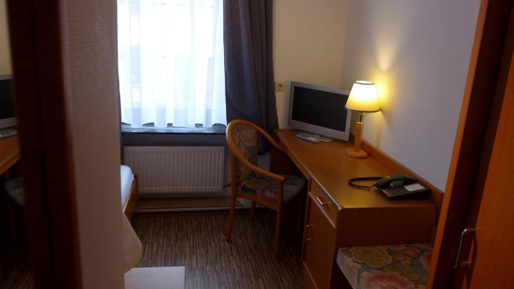 Телевізор і / або розважальний центр в Central-Hotel Greiveldinger