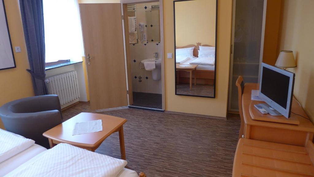 Телевізор і / або розважальний центр в Central-Hotel Greiveldinger