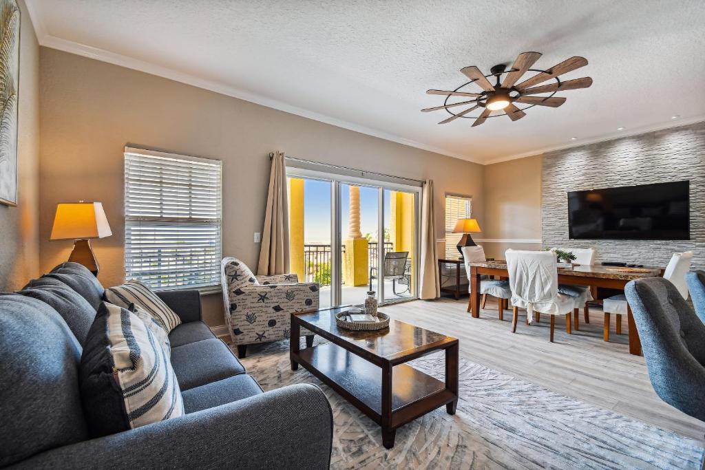 a living room with a couch and a table at Treasure Island beach retreat in St. Pete Beach